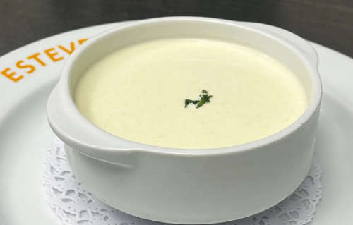 Cold leek vichyssoise at Restaurant Ca L'Estevet, traditional Catalan cuisine in Barcelona